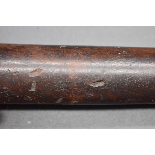 1715 - An antique truncheon, with ribbed handle, 40cm long. 