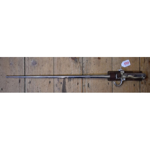 1717 - A French Lebel M1886 cruciform bayonet and scabbard, stamped RP and numbered 98494, with leather fro... 