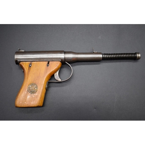 1724 - A Dolla Mk11 .177 calibre push barrel air pistol.