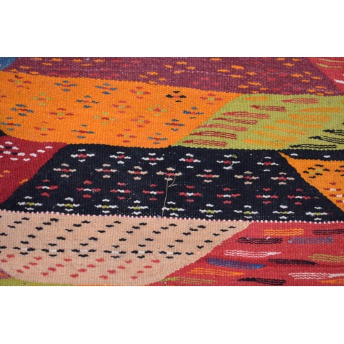 1066 - A Persian Shiraz flatweave rug, 298cm x 197cm.