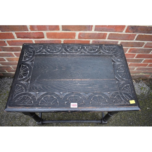 1029 - An antique carved occasional table, 66cm wide x 44cm deep x 76cm high. 