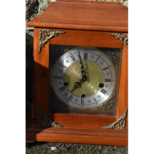 1062 - A Zench wall clock; together with a mantel clock and a Rhythm mantel clock.  ... 