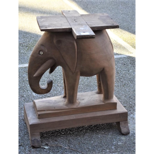 1064 - WITHDRAWN FROM SALE: A carved elephant table base.