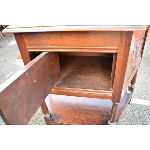 1066 - A 1960s carved oak table. 