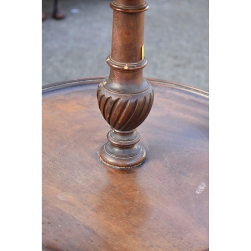 1070 - An antique mahogany dumbwaiter; together with a mahogany tripod table. 