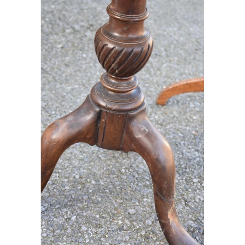 1070 - An antique mahogany dumbwaiter; together with a mahogany tripod table. 