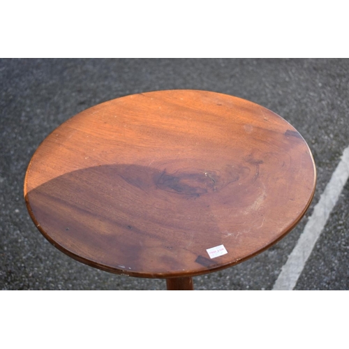 1070 - An antique mahogany dumbwaiter; together with a mahogany tripod table. 