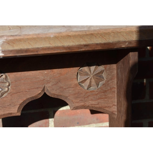 1071 - A carved oak prie dieu prayer desk; together with a Georgian oak tripod table and an oak stool.... 