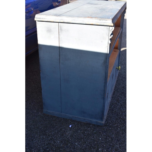 1073 - An old pine blue painted counter, 130cm wide x 64cm deep x 99cm high.