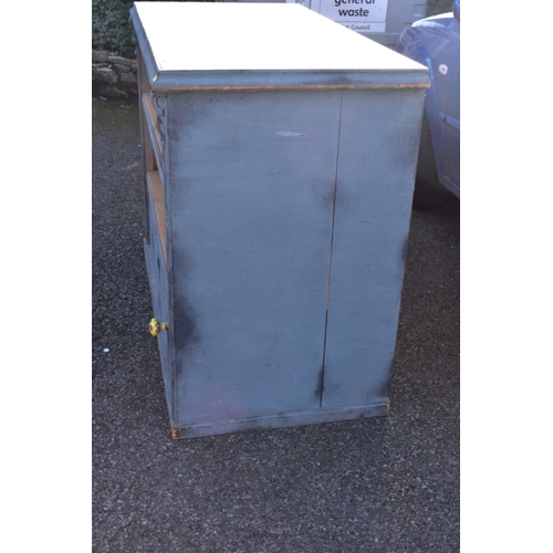 1073 - An old pine blue painted counter, 130cm wide x 64cm deep x 99cm high.