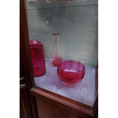 1085 - A collection of Victorian cranberry glass, to include: vases and two electroplate mounted casters. (... 