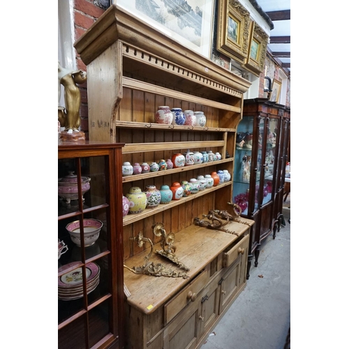 1086 - An 19th century Irish pine dresser, 203.5cm high x 162.5cm wide x 44cm deep.