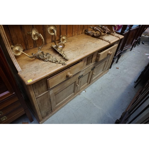 1086 - An 19th century Irish pine dresser, 203.5cm high x 162.5cm wide x 44cm deep.