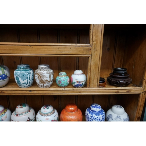 1087 - A collection of Chinese ginger jars, most with covers, largest 15cm high; together with four further... 