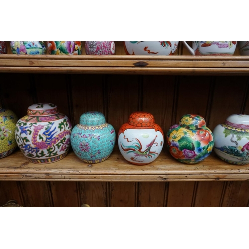 1087 - A collection of Chinese ginger jars, most with covers, largest 15cm high; together with four further... 