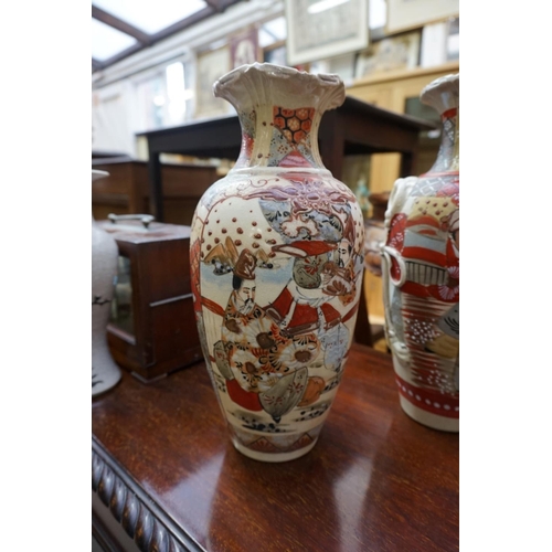 1097 - A small group of Chinese and Japanese pottery and porcelain, to include a pair of Satsuma vases, 31c... 