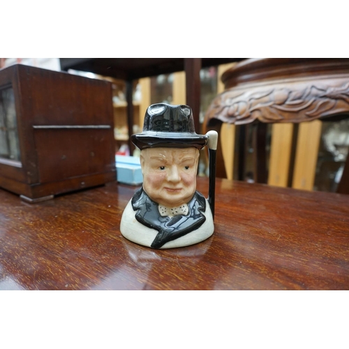 1098 - A mixed group of character jugs, to include Winston Churchill examples. (9)