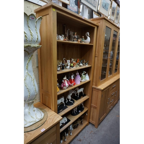 1126 - A contemporary pale oak open bookcase, 91.5cm wide. 