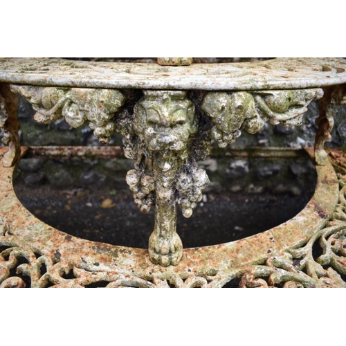 1717 - A pair of Victorian white painted cast iron four tier semi-circular plant stands, in the manner of C... 