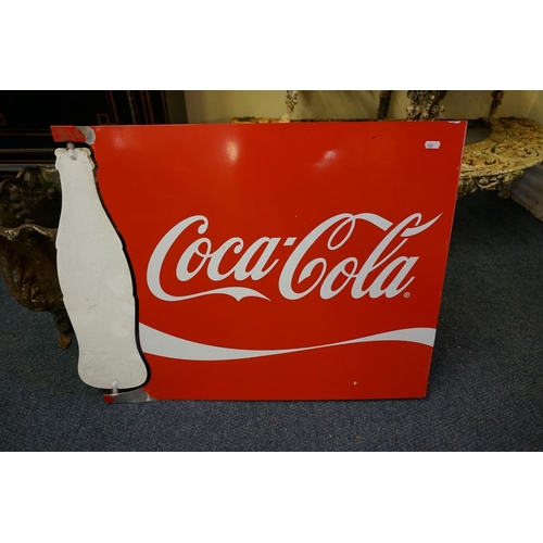 1743 - An aluminium Coca-Cola sign, with revolving 'bottle', 52.5 x 70cm.