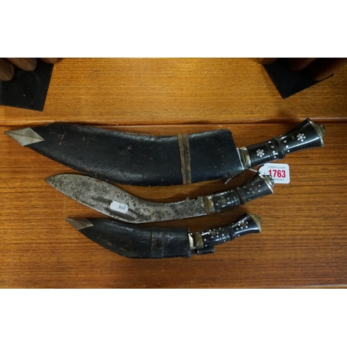 1763 - Three kukris and two scabbards. 