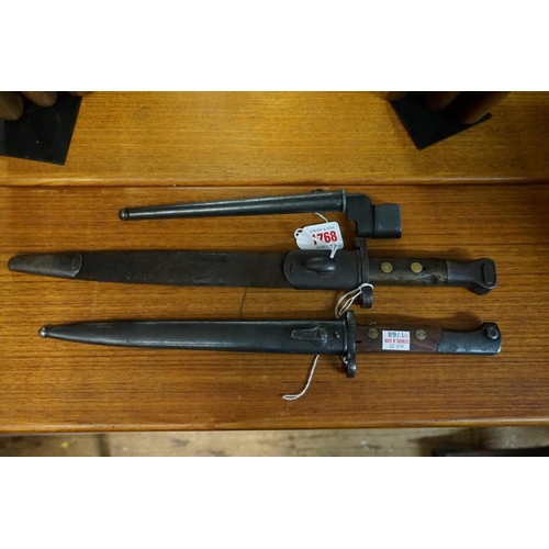 1768 - A Russian bayonet and steel scabbard; together with another bayonet and leather scabbard; and a spik... 