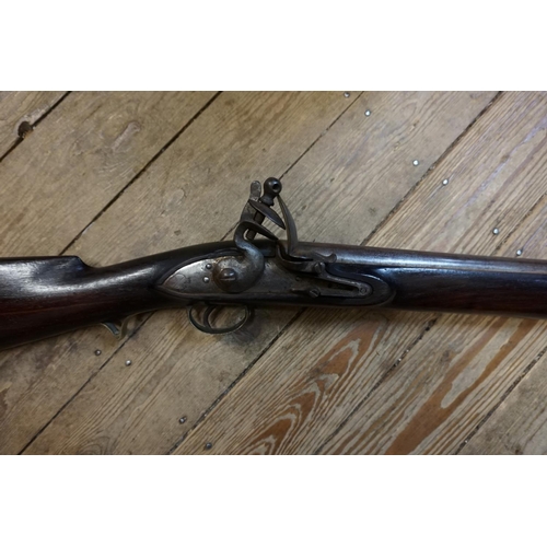 1771 - An antique flintlock musket, inscribed 1795 to lock plate, 136cm.