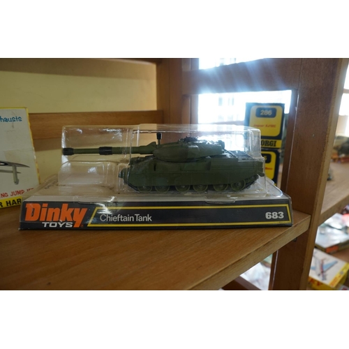 841 - Dinky: three vintage Dinky vehicles, comprising: 615 US Jeep with 105mm Howitzer; 683 Chieftan ... 