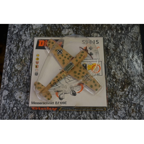 848 - Dinky: a group of four vintage Dinky, comprising: 721 Junkers JU 87B Stuka; 726 Messerschmitt B... 