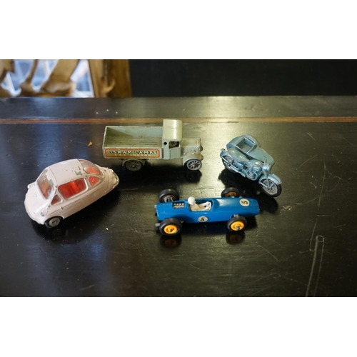 855 - Corgi: a Lotus Esprit; Aston Martin Volante and a James Bond Aston Martin DB5 (discoloured, all... 