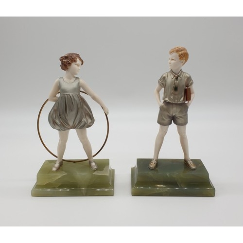 1634 - Ferdinand Preiss, 'Hoop Girl and 'Sonny Boy', a good pair of ivory and cold painted bronze figures, ...