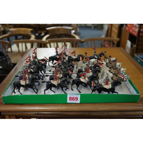 869 - Britains: fourteen vintage lead Britains mounted Life Guards and Horse Guards; together with four mo... 