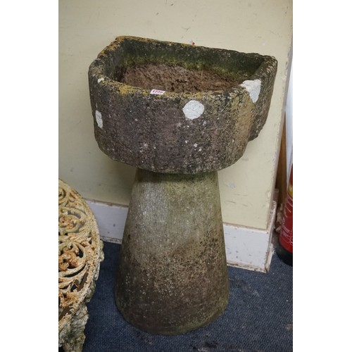 1772 - A carved stone bowfront basin or small trough, 48.5cm wide, on sandstone tapered pedestal.... 