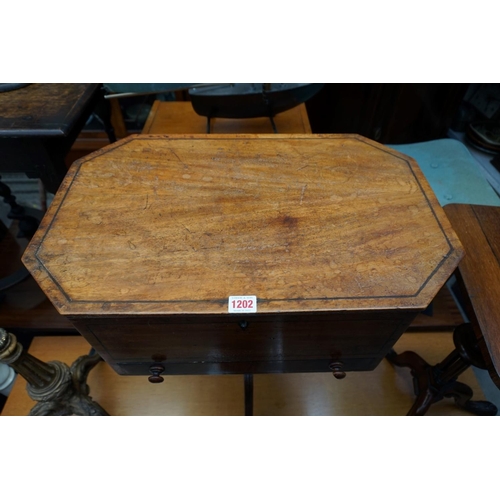 1083 - WITHDRAWN FROM SALE: An antique mahogany tripod work table, with hinged top, 56.5cm wide.... 