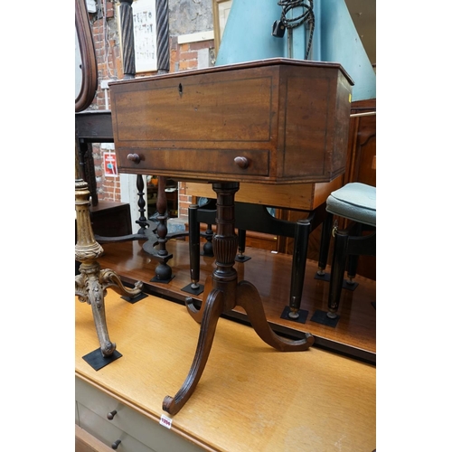 1083 - WITHDRAWN FROM SALE: An antique mahogany tripod work table, with hinged top, 56.5cm wide.... 