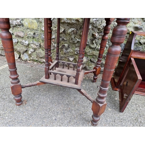 1021 - A late Victorian walnut hexagonal table, 66.5cm high x 74xm wide; together with a hanging cupboard.... 