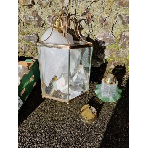 1059 - A ceiling lantern; together with a small glass shade; and two brass preserve pans.