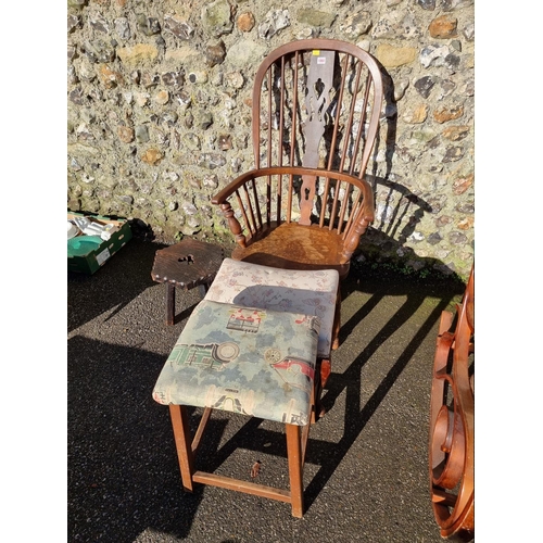 1060 - An old oak Windsor style chair; together with three old stools. 