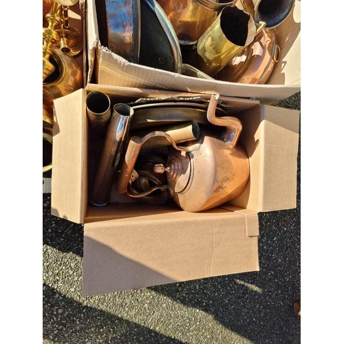 1063 - Three boxes of metalware, to include trivets, copper kettle and a brass shell case.