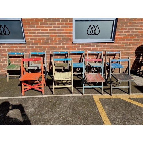 1077 - A set of ten painted wood folding garden chairs. 