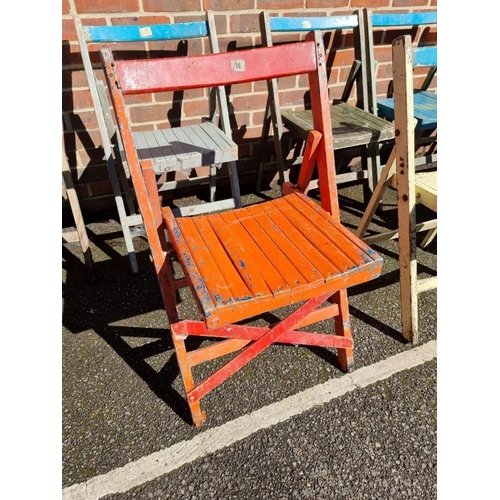 1077 - A set of ten painted wood folding garden chairs. 