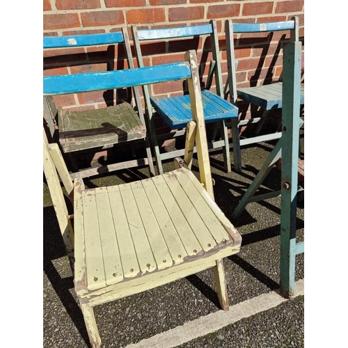 1077 - A set of ten painted wood folding garden chairs. 