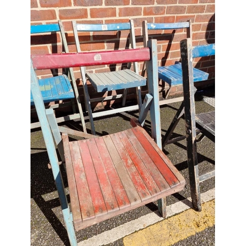 1077 - A set of ten painted wood folding garden chairs. 