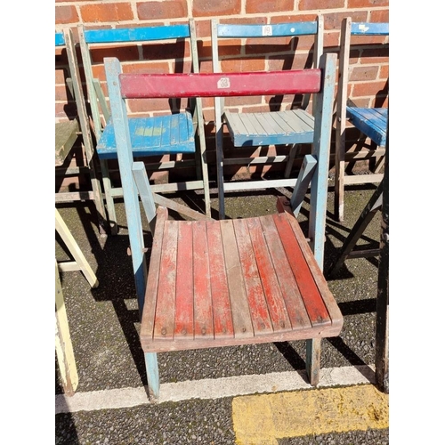 1077 - A set of ten painted wood folding garden chairs. 