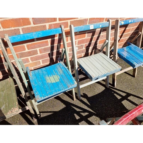 1077 - A set of ten painted wood folding garden chairs. 