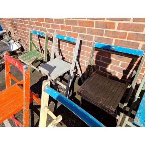 1077 - A set of ten painted wood folding garden chairs. 