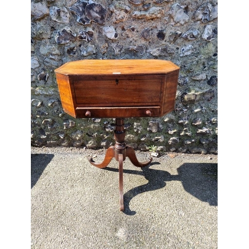 1083 - WITHDRAWN FROM SALE: An antique mahogany tripod work table, with hinged top, 56.5cm wide.... 