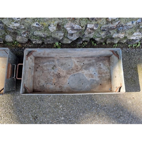 1084 - A pair of galvanised metal troughs.