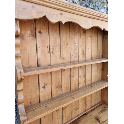 1093 - An old pine dresser and rack, 120cm wide x 194cm high.