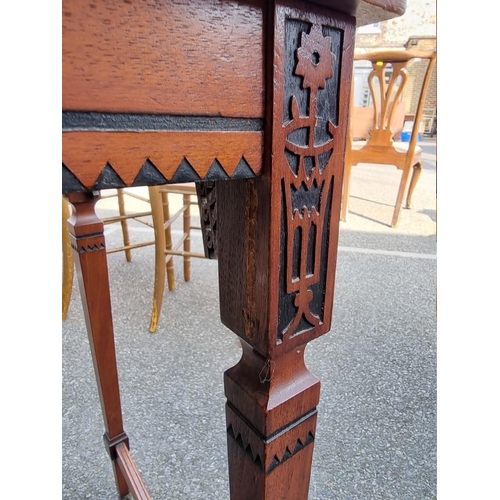 1096 - A carved and inlaid two tier occasional table, 69cm wide x 42cm deep x 67cm high. ... 